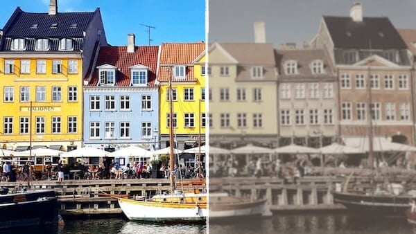 Billedet viser Grå stær symptomer illustreret ved et billede af Nyhavn, hvor farverne er svagere.