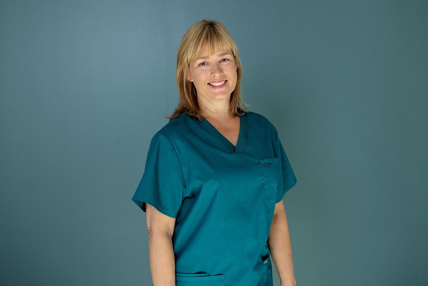 Portrætbillede af Berit, optometrist på Øjenhospitalet Danmark.