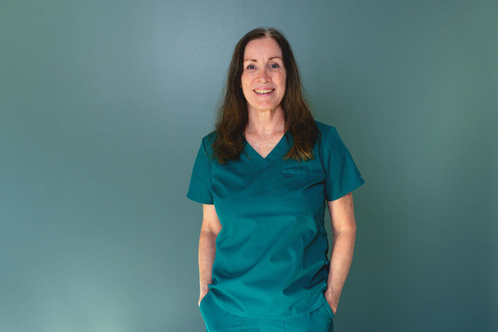 Portrætbillede af Susanne, operationssygeplejerske på Øjenhospitalet Danmark.