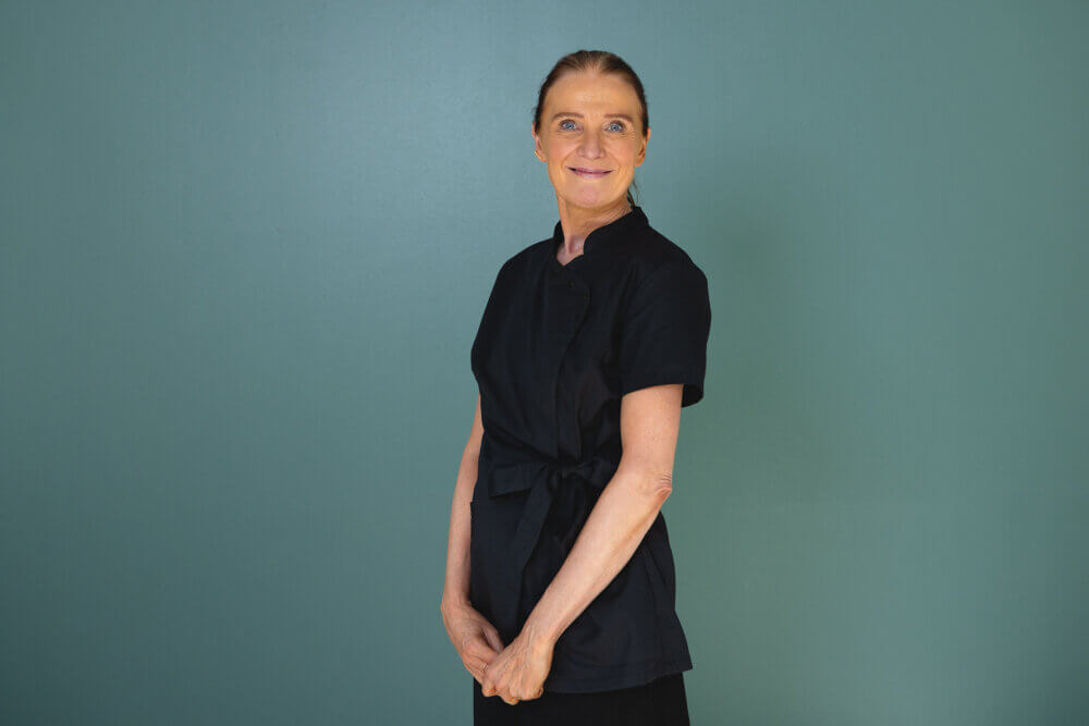 Portrætbillede af Hanne, patientkoordinator på Øjenhospitalet Danmark.